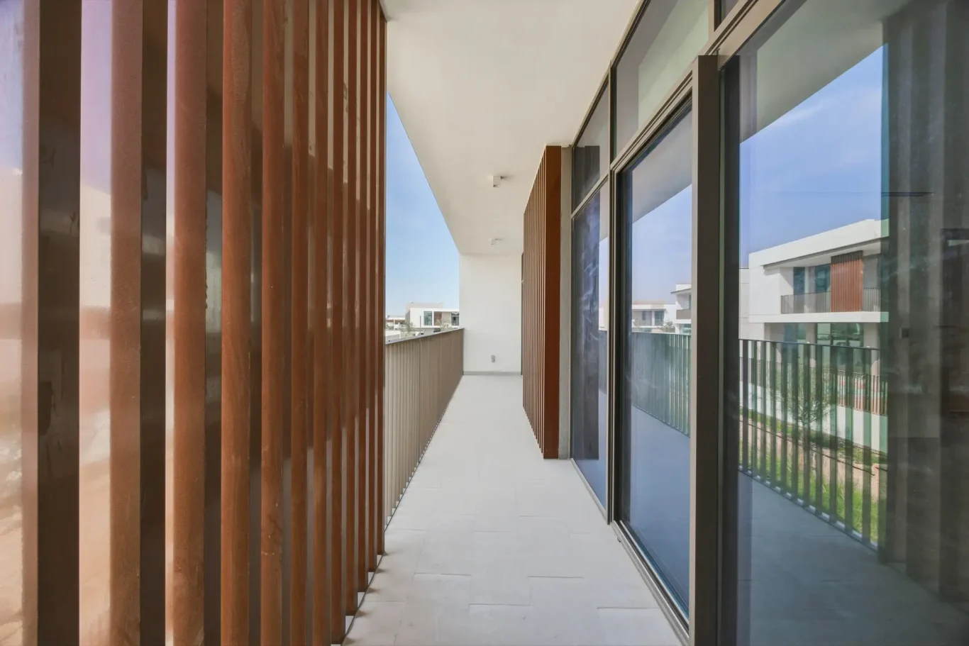 Family room looking toward the terrace doors. Villa photography by MRPS in Dubai for ELITE Property Brokerage.