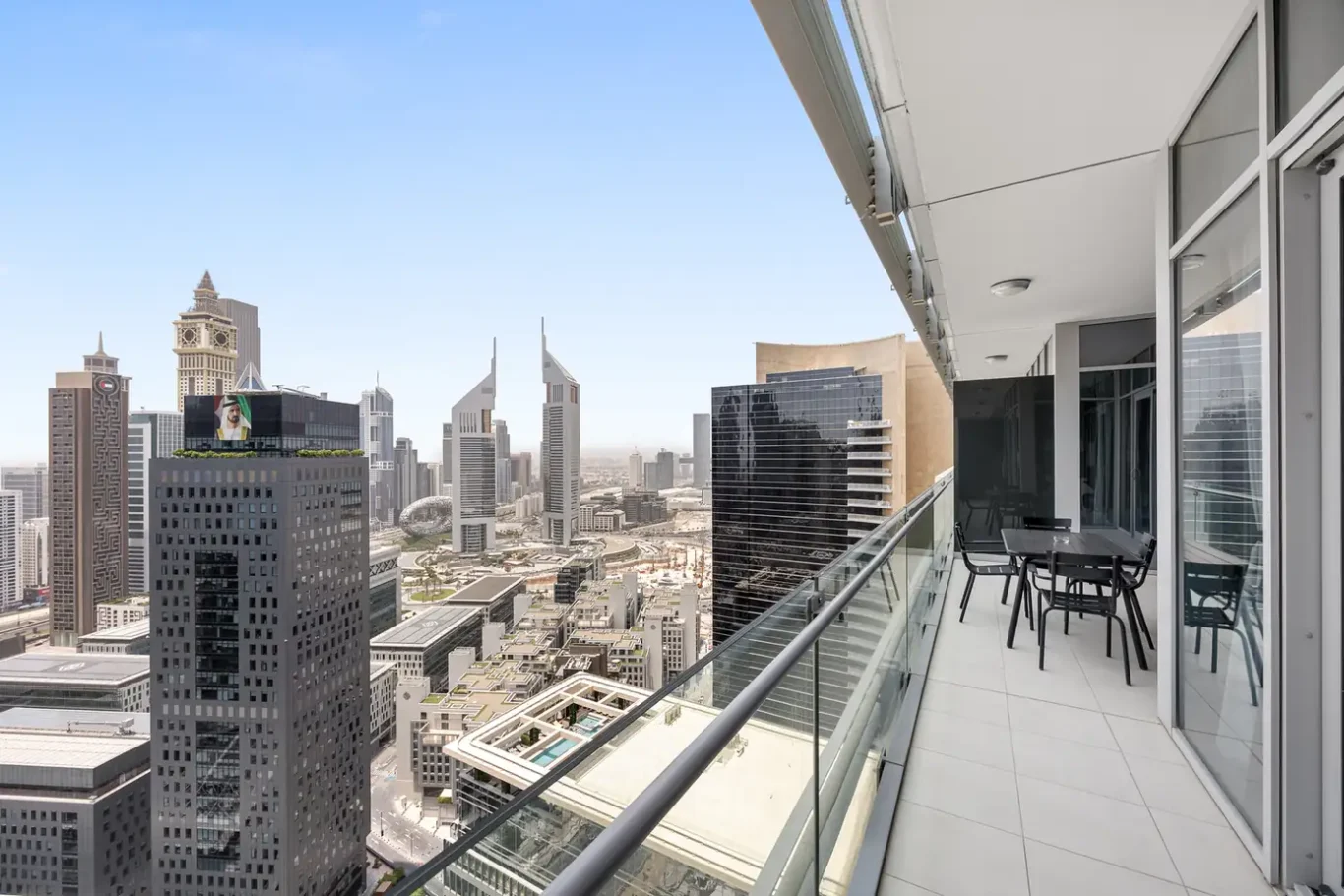 Balcony view over the DIFC skyline in a Your Stay Apartments one-bedroom at Burj Daman, DIFC, Dubai.