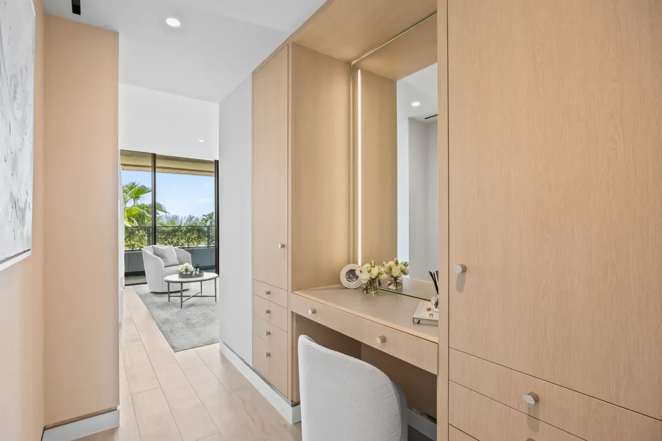 Dressing table and wardrobes in a furnished three-bedroom residence at Atlantis The Royal, Palm Jumeirah, photographed for Apex Homes Real Estate.