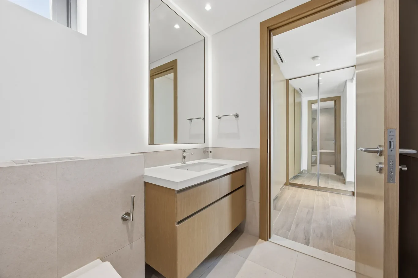 Master bathroom with bathtub and twin vanity. Villa photography by MRPS in Dubai for ELITE Property Brokerage.