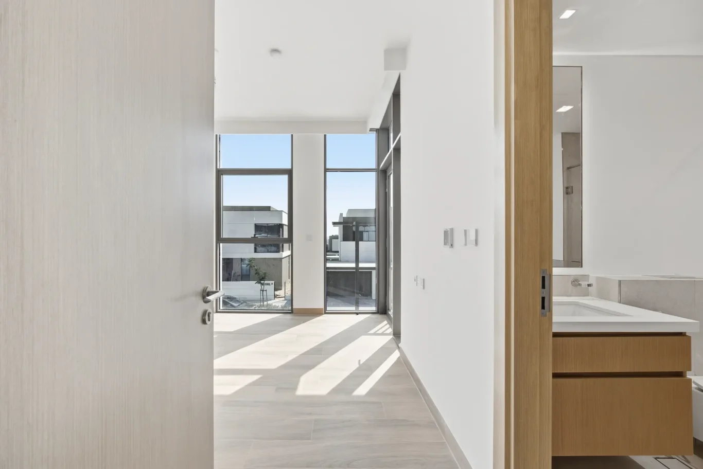 Master bathroom vanity and mirror. Villa photography by MRPS in Dubai for ELITE Property Brokerage.