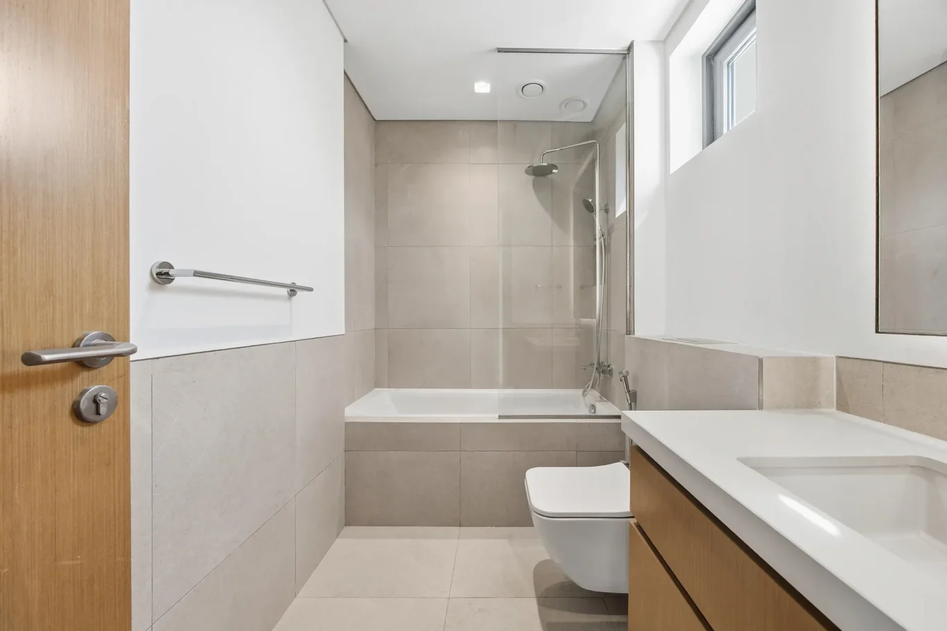 Bathroom seen from the bedroom doorway. Villa photography by MRPS in Dubai for ELITE Property Brokerage.