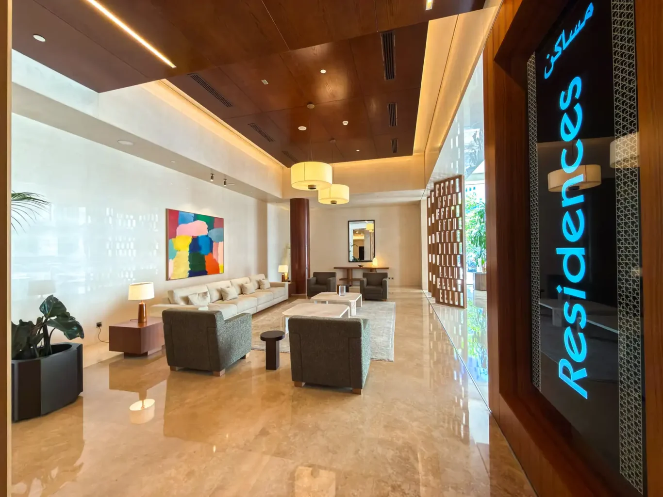 Residences entrance with marble floor at Burj Daman, DIFC, photographed for Your Stay Apartments.