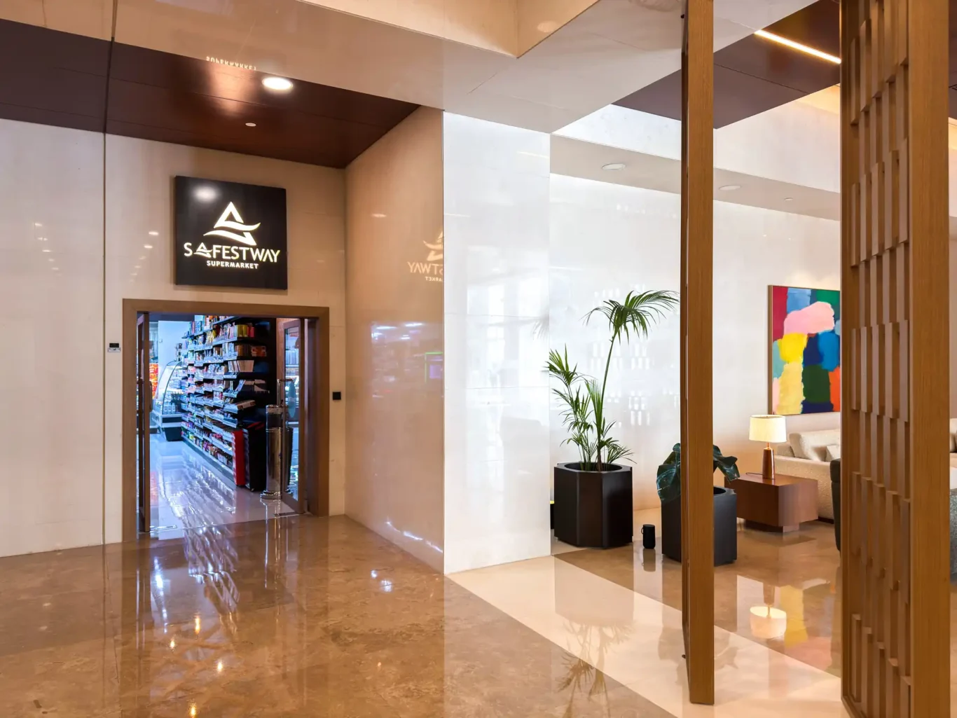 Lobby corridor with timber screens at Burj Daman, DIFC, photographed for Your Stay Apartments.