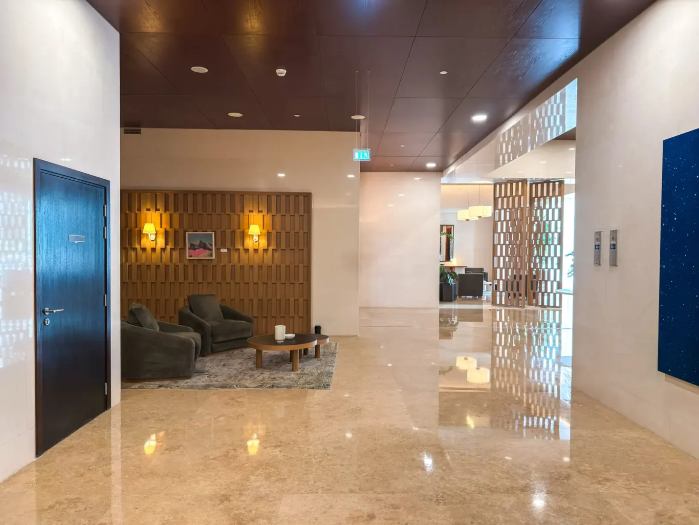Lobby seating area at Burj Daman, DIFC, photographed for Your Stay Apartments.