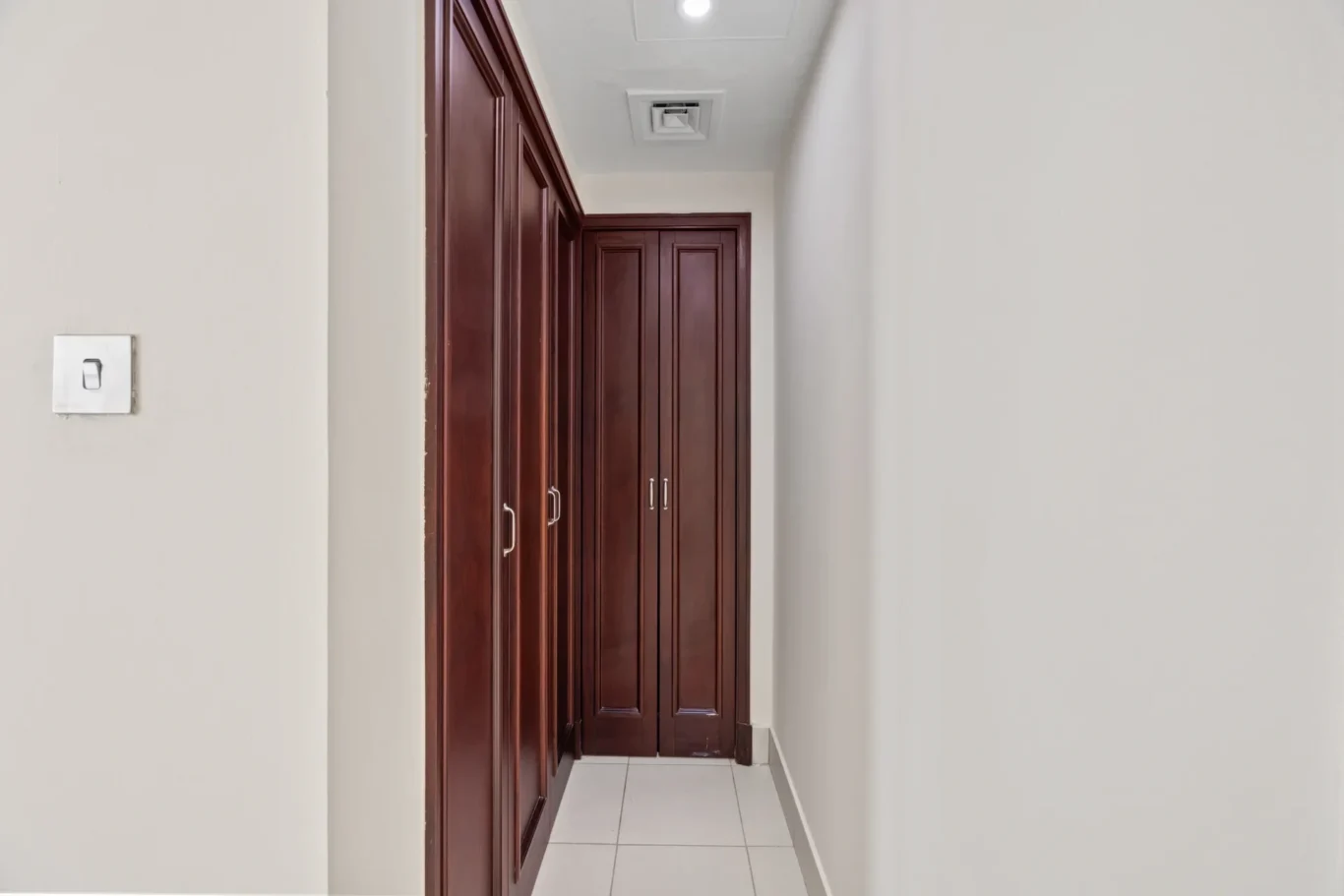 Built-in storage wardrobe in an unfurnished two-bedroom garden apartment in Old Town, Downtown Dubai, photographed for ELITE Property Brokerage.