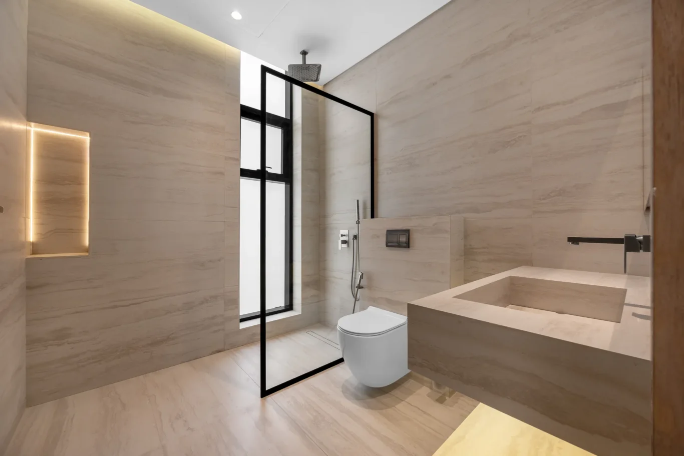 En-suite bathroom with a stone basin and walk-in shower, unfurnished five-bedroom villa in Al Furjan, Dubai.