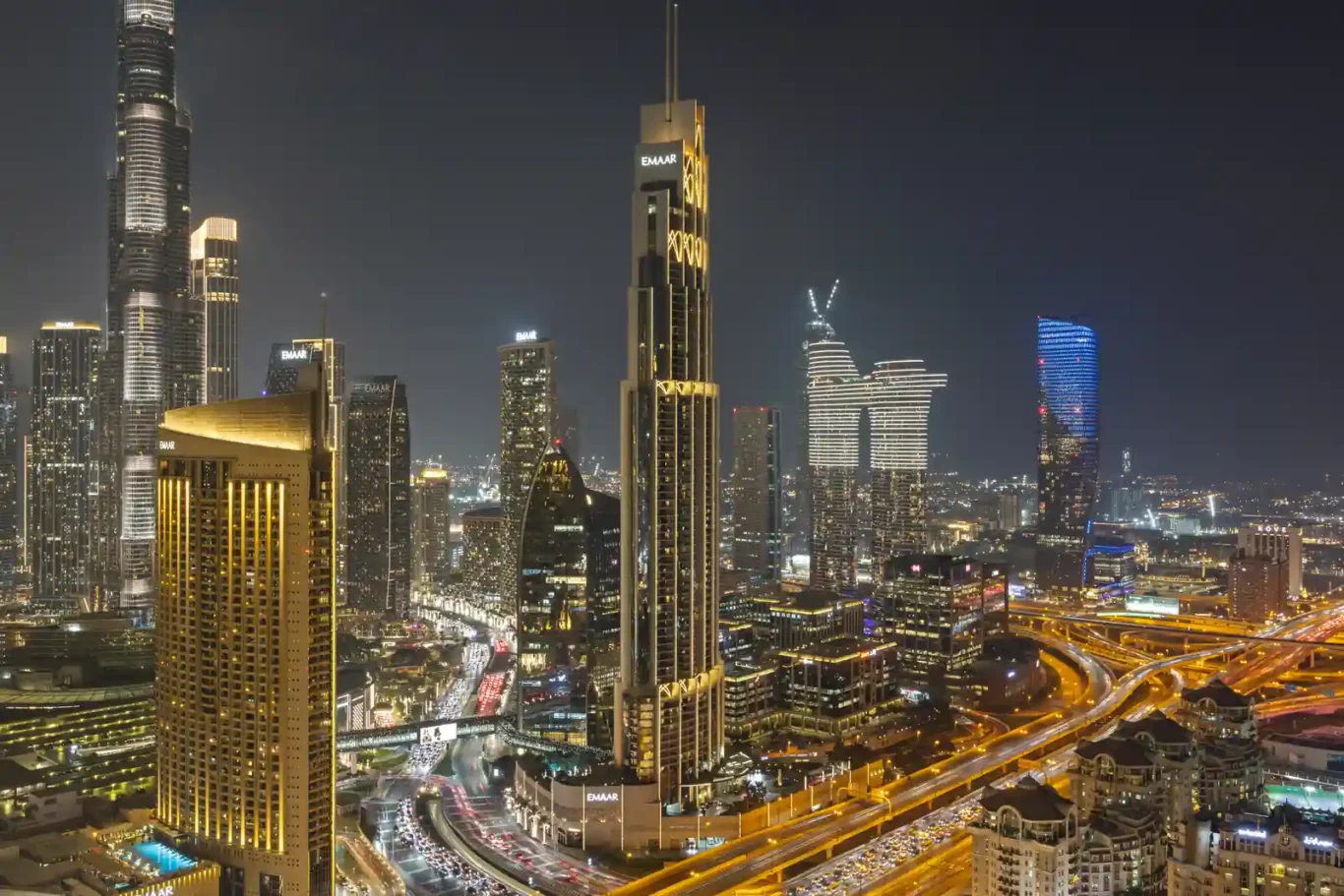 Burj Khalifa at night seen from the apartment balcony. Day, twilight and night Airbnb photography by MRPS for Vista Haus Holiday Homes in Downtown Dubai.