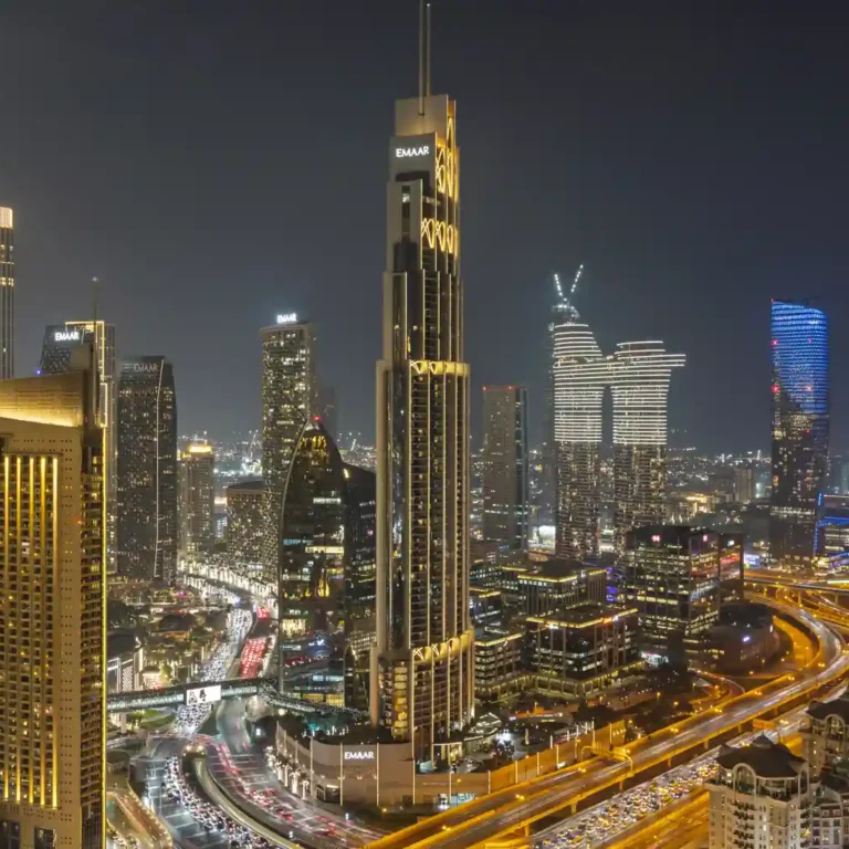 Burj Khalifa at night seen from the apartment balcony. Day, twilight and night Airbnb photography by MRPS for Vista Haus Holiday Homes in Downtown Dubai.