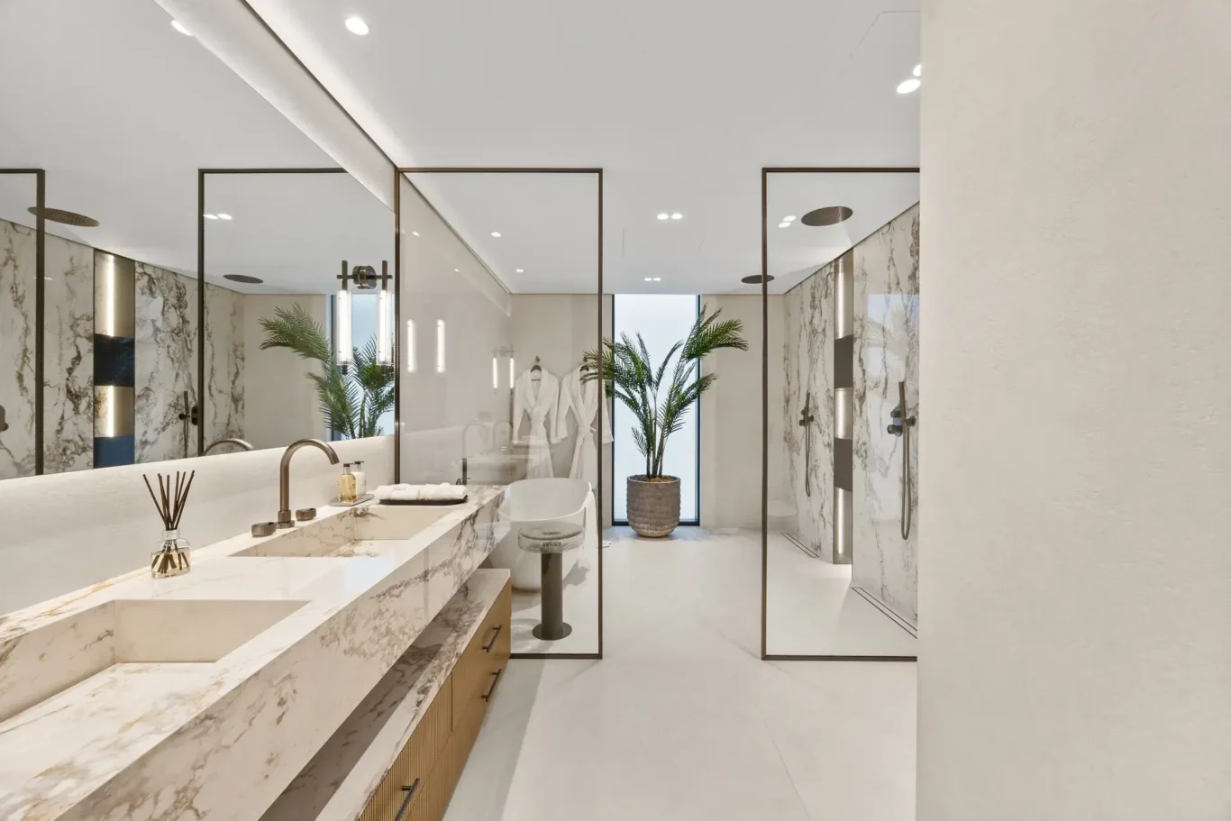 Master bathroom with a marble double vanity and walk-in showers, luxury villa in Jumeirah Islands, Dubai.