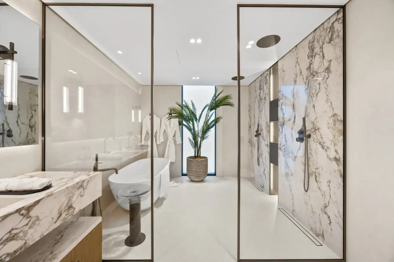 Master bathroom with a freestanding bathtub and marble shower, luxury villa in Jumeirah Islands, Dubai.