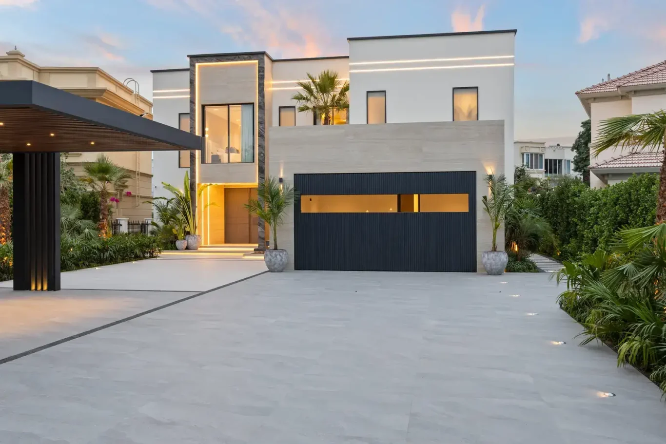 Front exterior with the carport and garage at sunset, luxury villa in Jumeirah Islands, Dubai.
